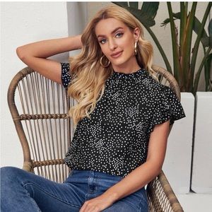 Black blouse with white polka dots